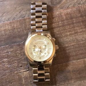 Michael Kors women’s large gold runway watch